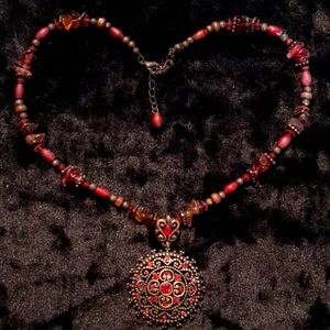 Vintage look red rhinestone and bronze medallion necklace